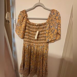 Yellow Francesca’s floral flowy mini dress